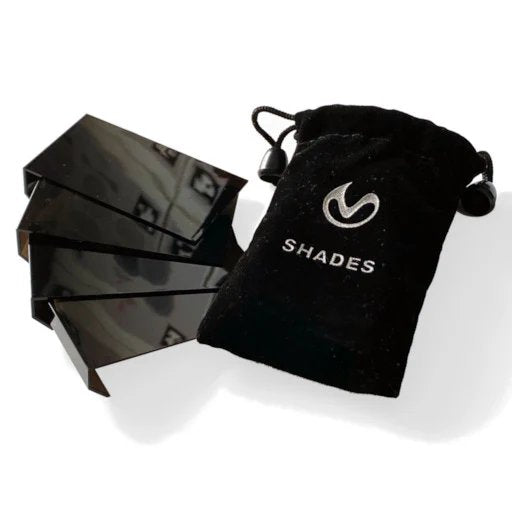 Enhance your Laser Academy training with Phone Shades, designed to improve laser shot detection in bright environments. These shades act like sunglasses for your phone, ensuring optimal app performance outdoors or in well-lit areas. Each set includes four shades in two sizes, with varying levels of darkness, all neatly stored in a velvet drawstring bag. Perfect for consistent and accurate training sessions, no matter the lighting conditions.